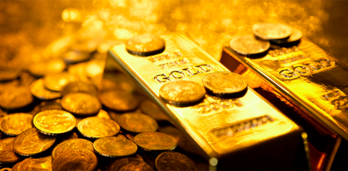 Gold eases as vaccine optimism counters rising Covid-19 cases
